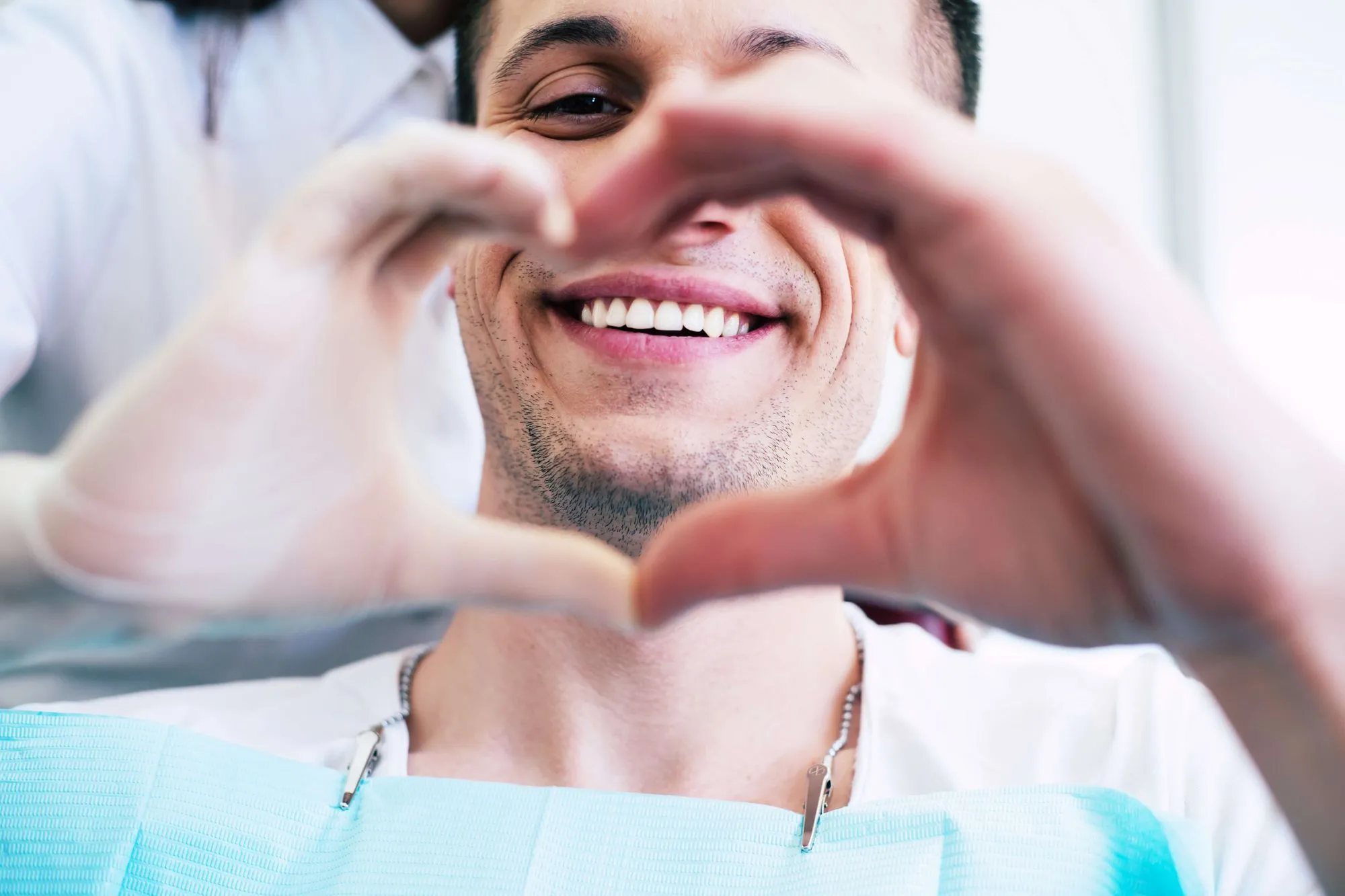 hand heart sign